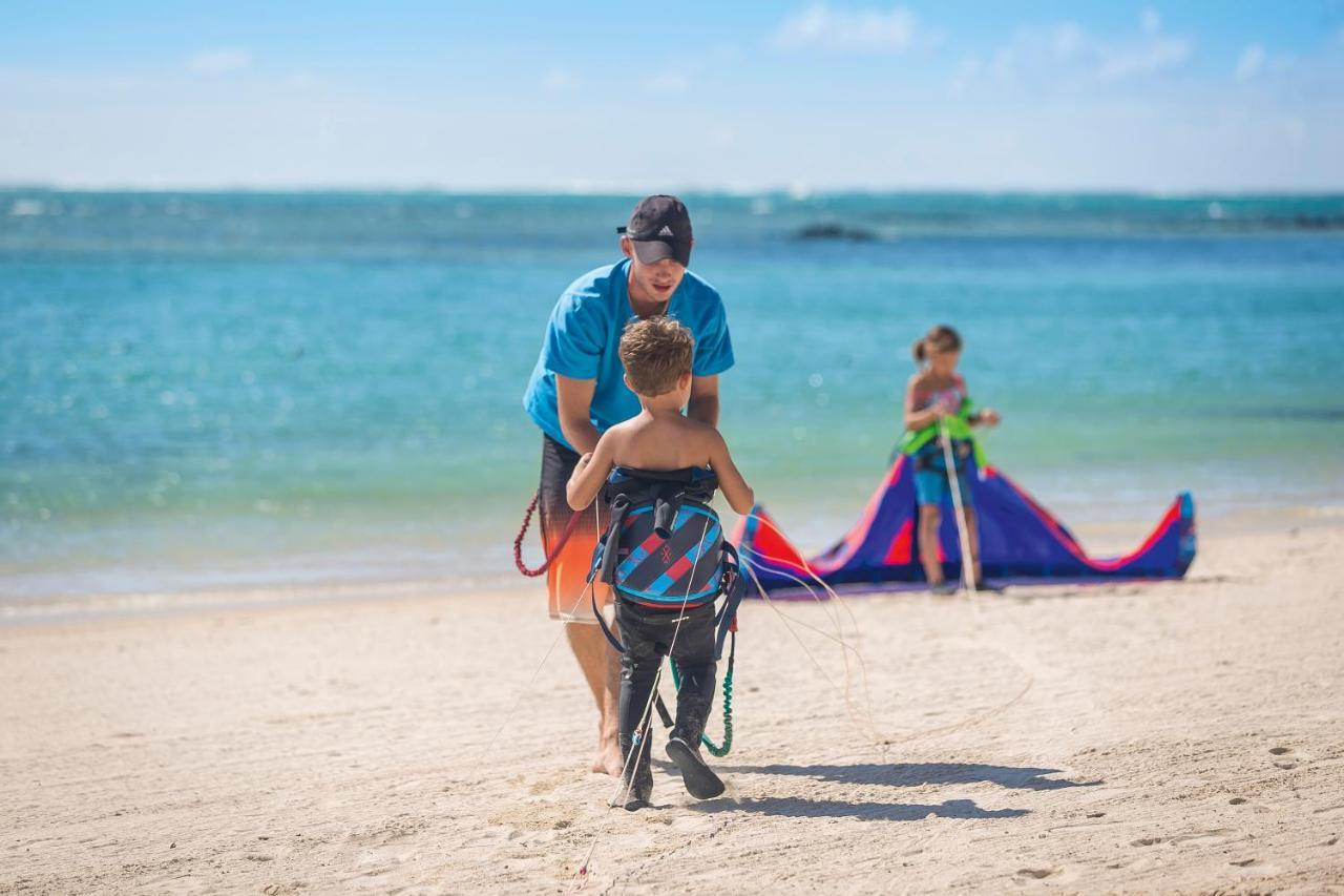 Constance Prince Maurice Poste de Flacq Exterior photo A kiteboarding instructor with a student