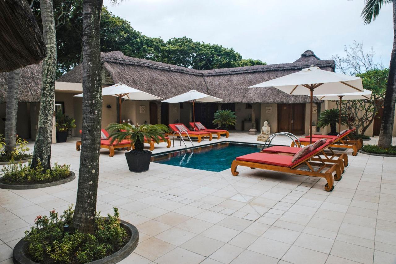 Constance Prince Maurice Poste de Flacq Exterior photo The pool at the Four Seasons Resort